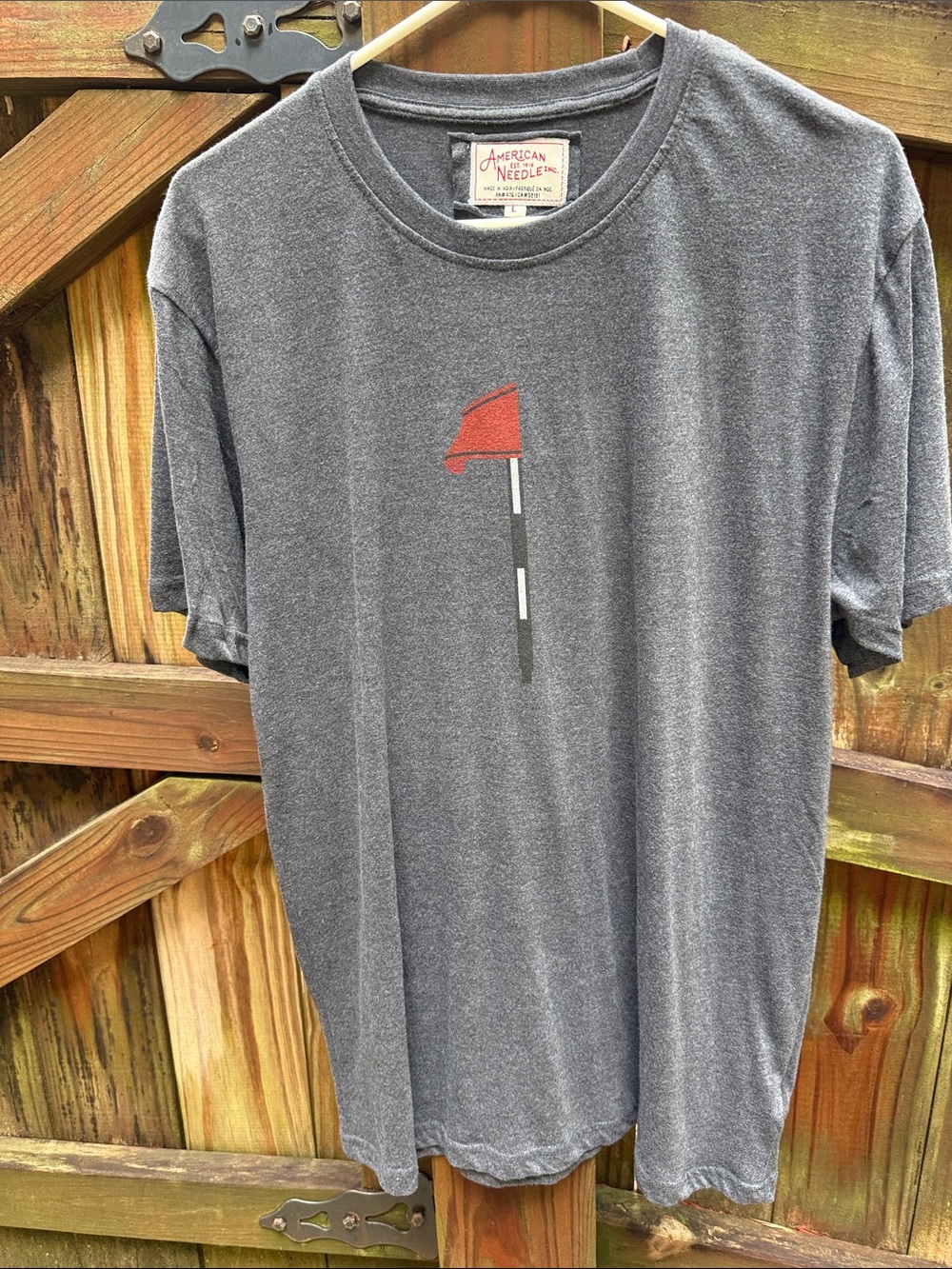 American Needle Gray Short Sleeve Tee with Red Flag Graphic